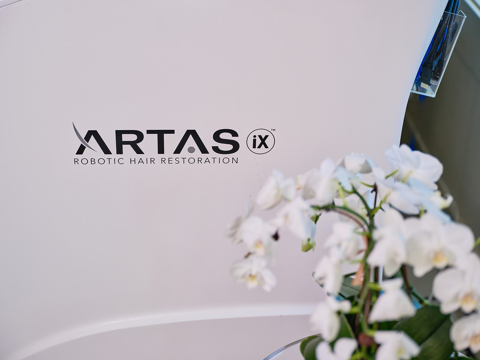 Venus ARTAS iX Robotic Hair Transplant System branding at Zen Regenerative Wellness
